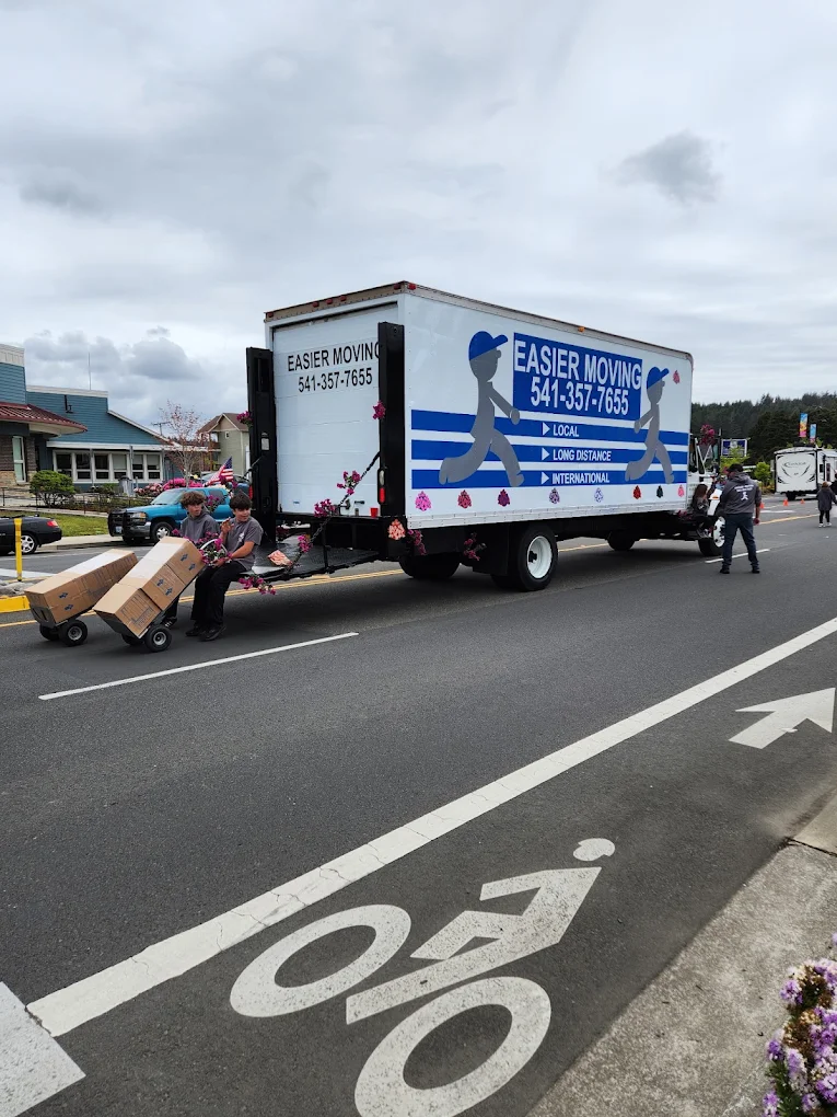 Easier Moving parade truck with hand trucks on the street